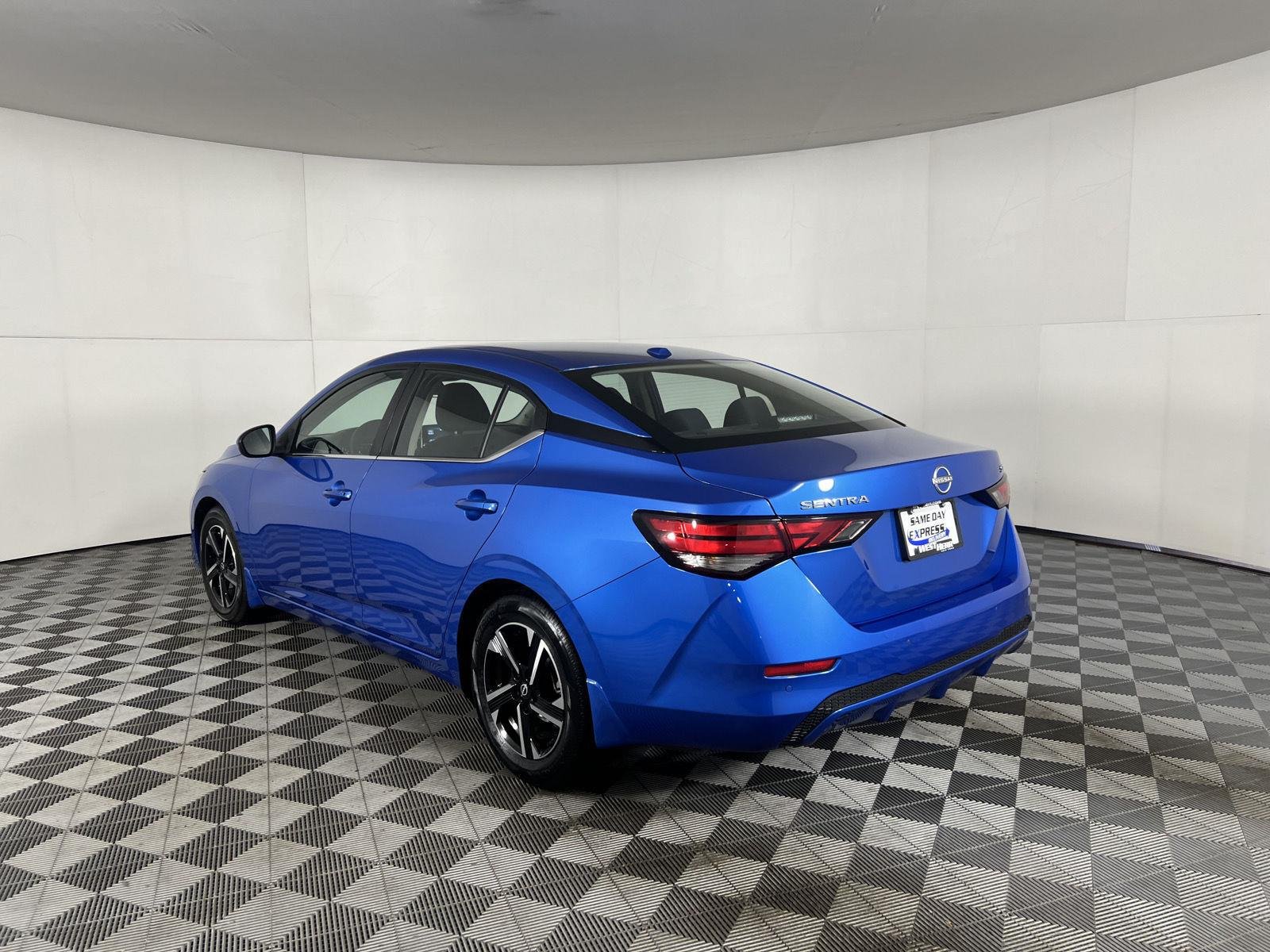 Used 2024 Electric Blue Metallic Nissan SV image 5