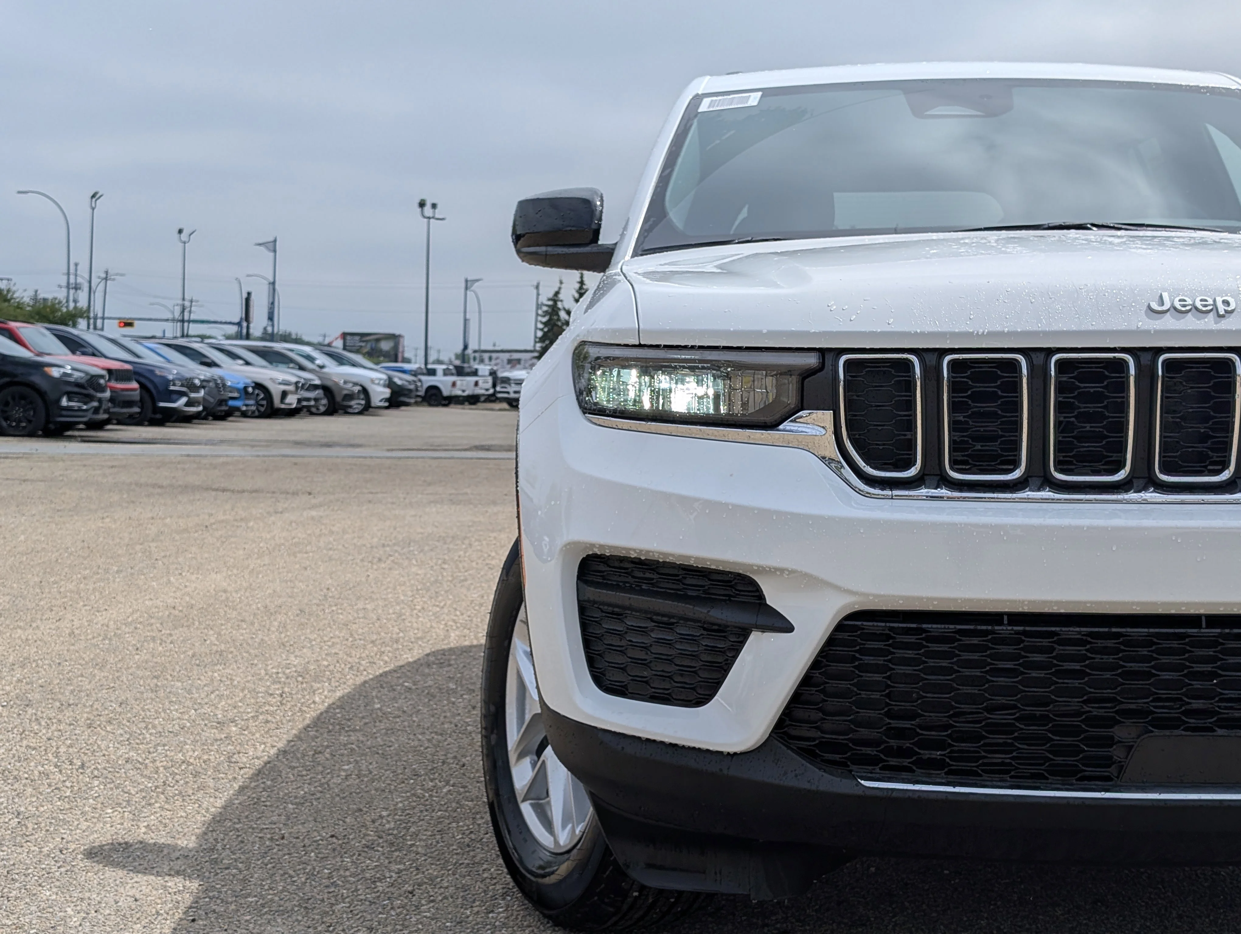 New 2026 Bright White Jeep Laredo image 11