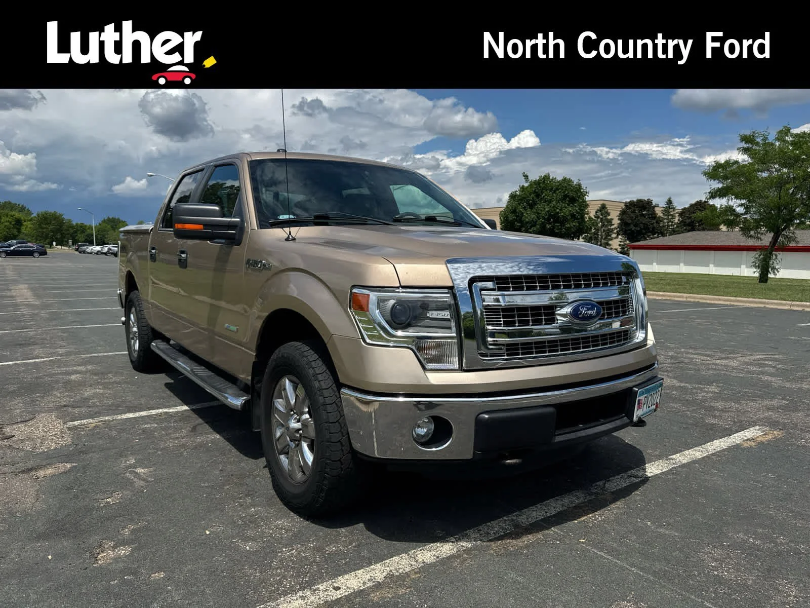Used 2014 Pale Adobe Metallic Ford XLT image 1