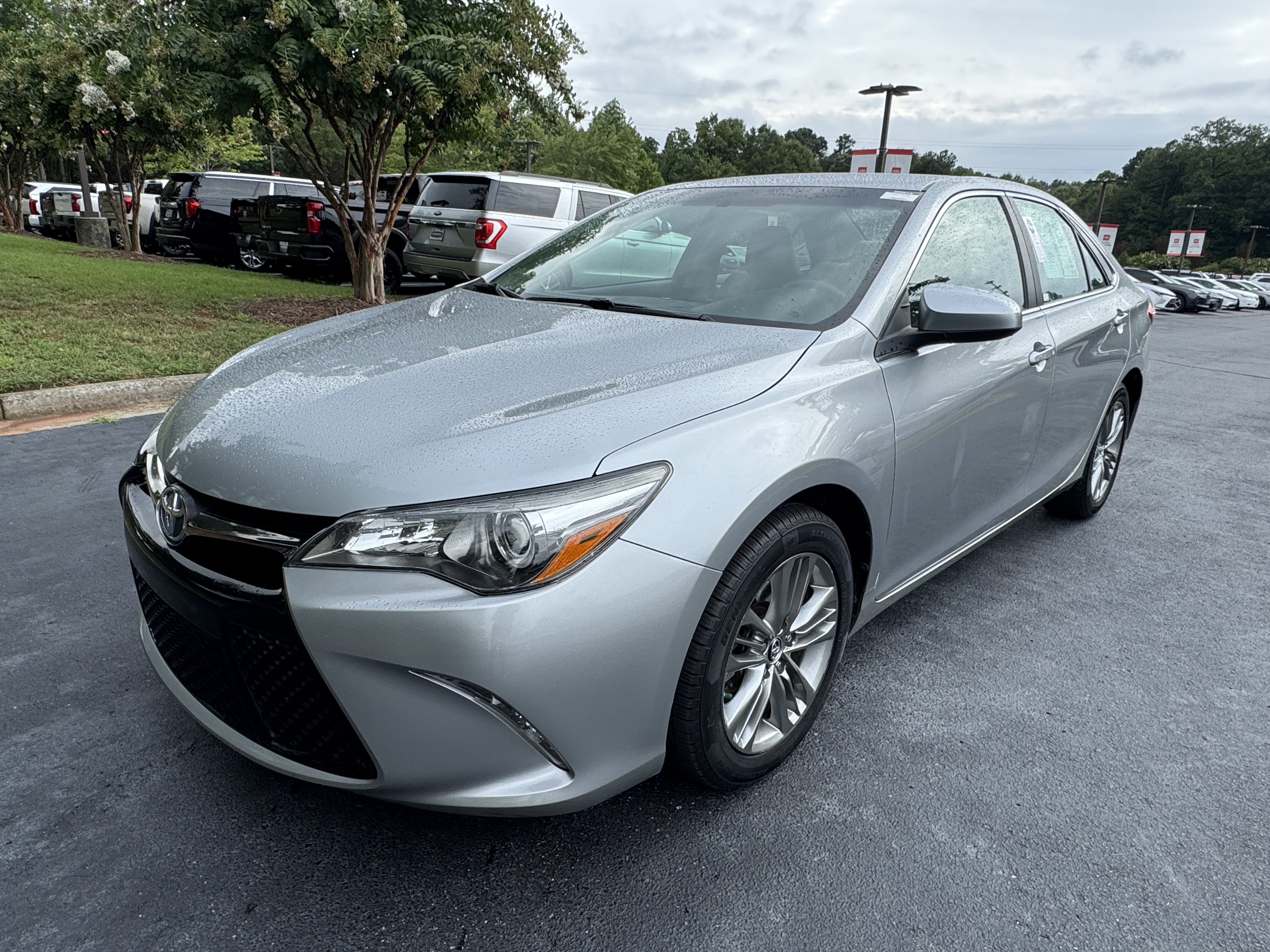 Used 2015 Celestial Silver Metallic Toyota SE image 1