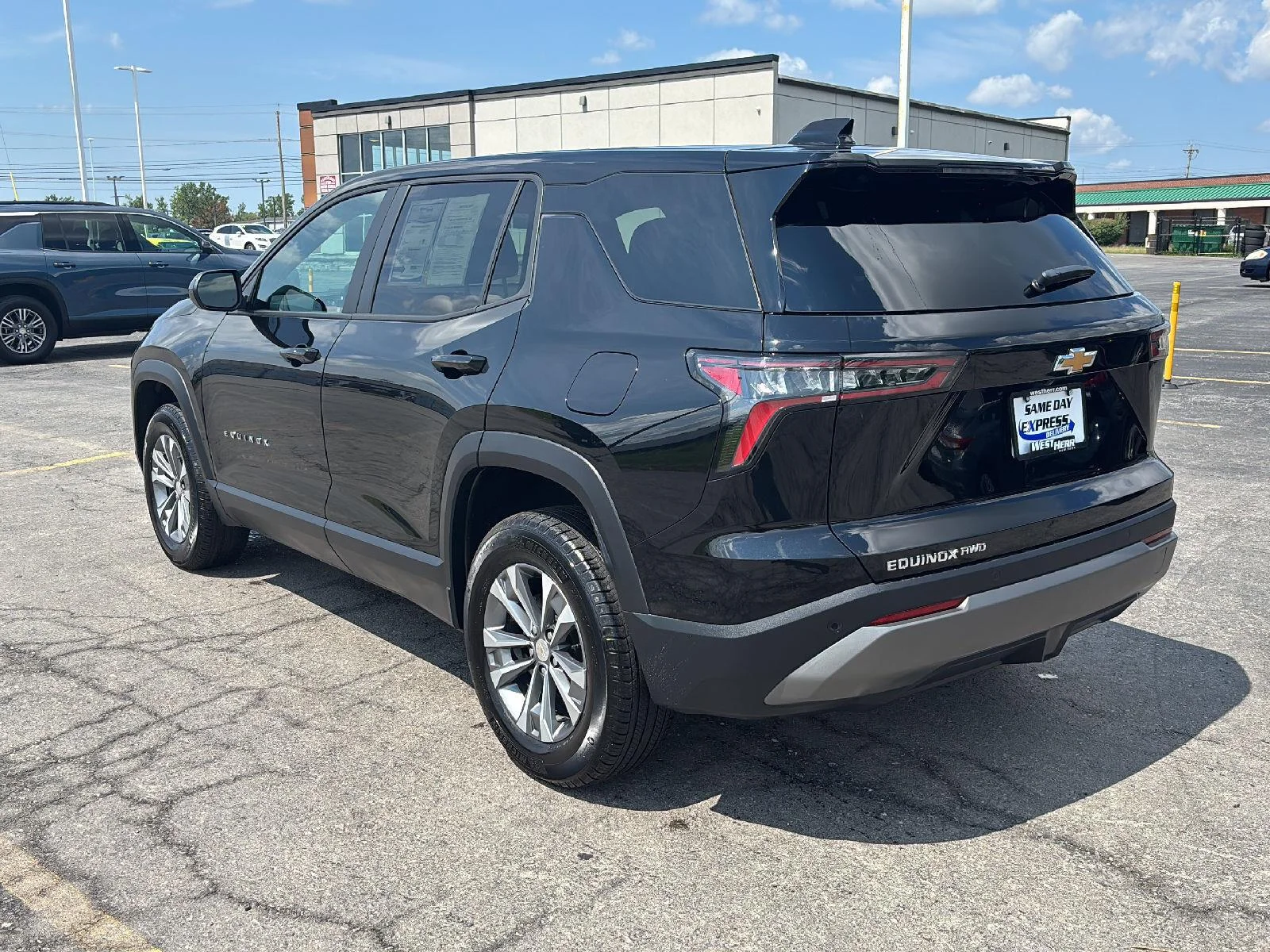 Used 2025 Mosaic Black Metallic Chevrolet AWD LT image 5