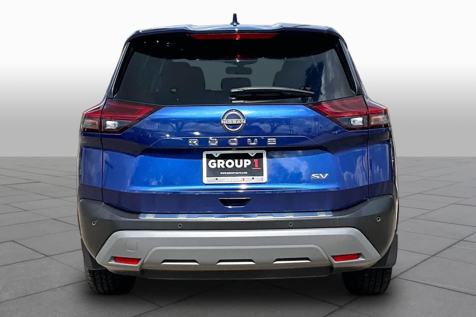 Used 2023 Caspian Blue Metallic Nissan SV image 8