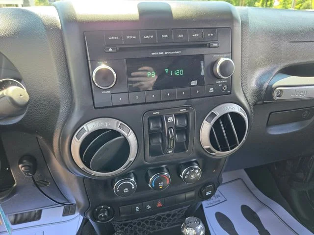 Used 2015 Black Jeep Unlimited Sport image 24