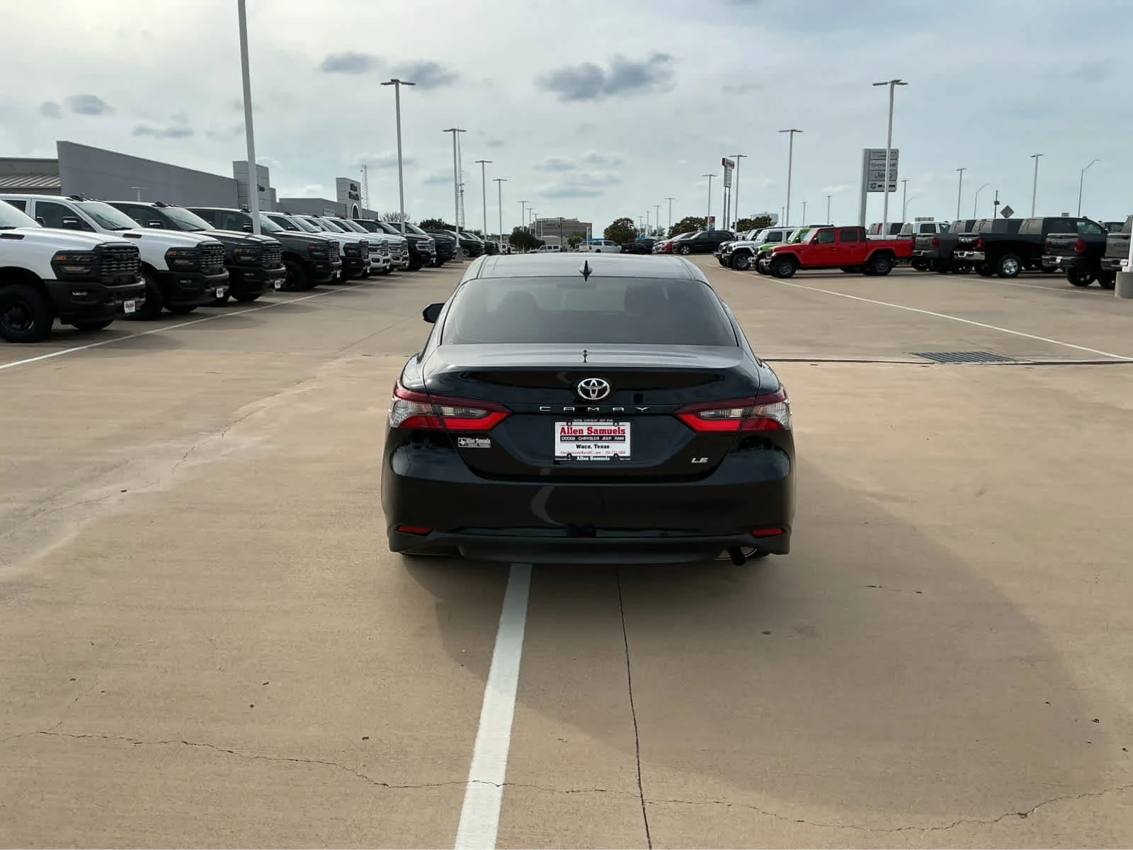 Used 2023 Midnight Black Metallic Toyota LE image 7