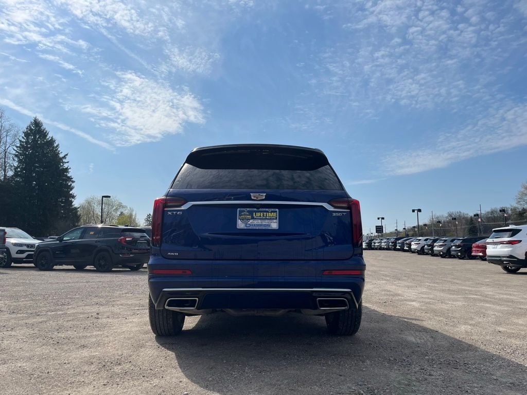 Used 2025 Blue Metallic Cadillac Luxury image 9