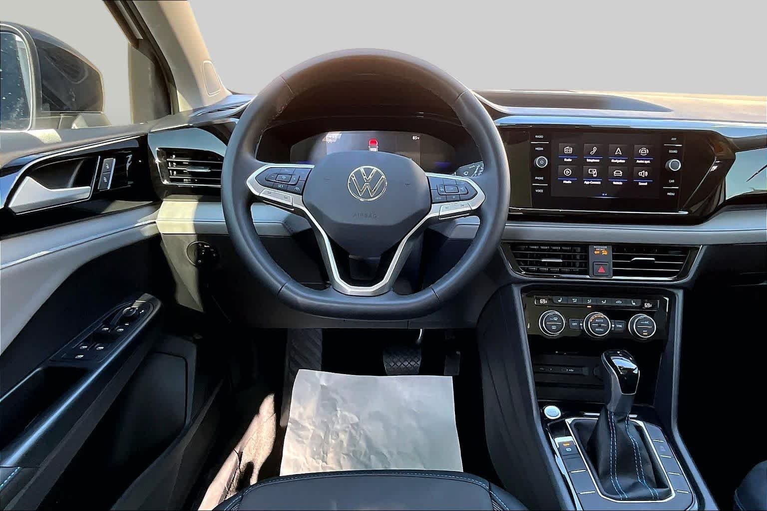 Used 2024 Pure White w/ Deep Black Roof Volkswagen SE Black image 8