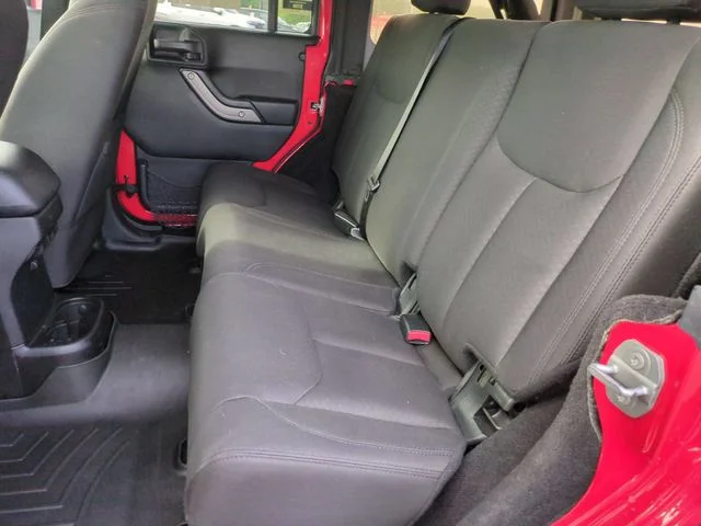 Used 2016 Red Jeep Unlimited Sport image 26
