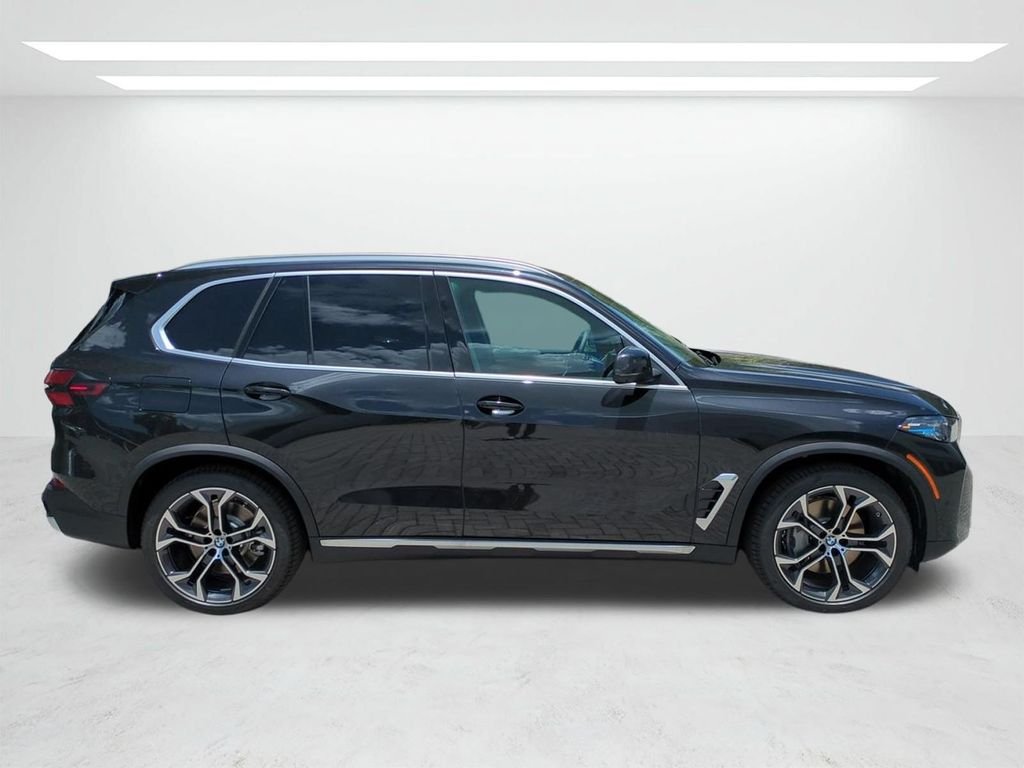 New 2026 Black Sapphire Metallic BMW xDrive50e image 3