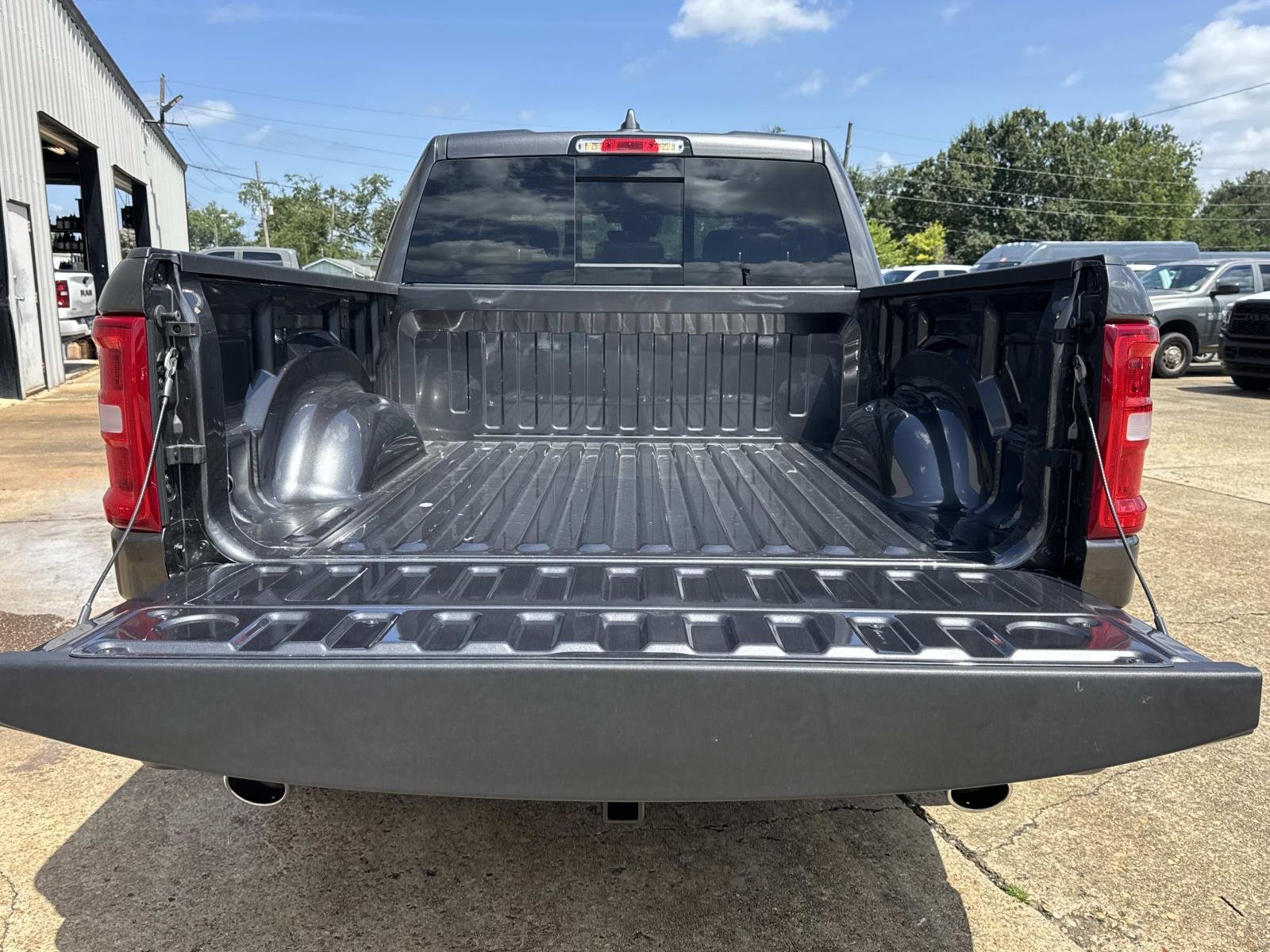 New 2026 Granite Crystal Metallic Clear-Coat Exterior Paint RAM Laramie image 6