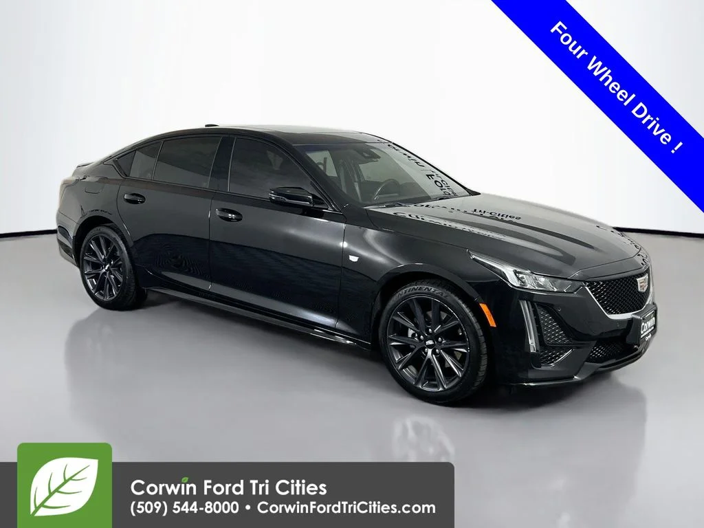 Used 2023 Black Cadillac Sport image 1