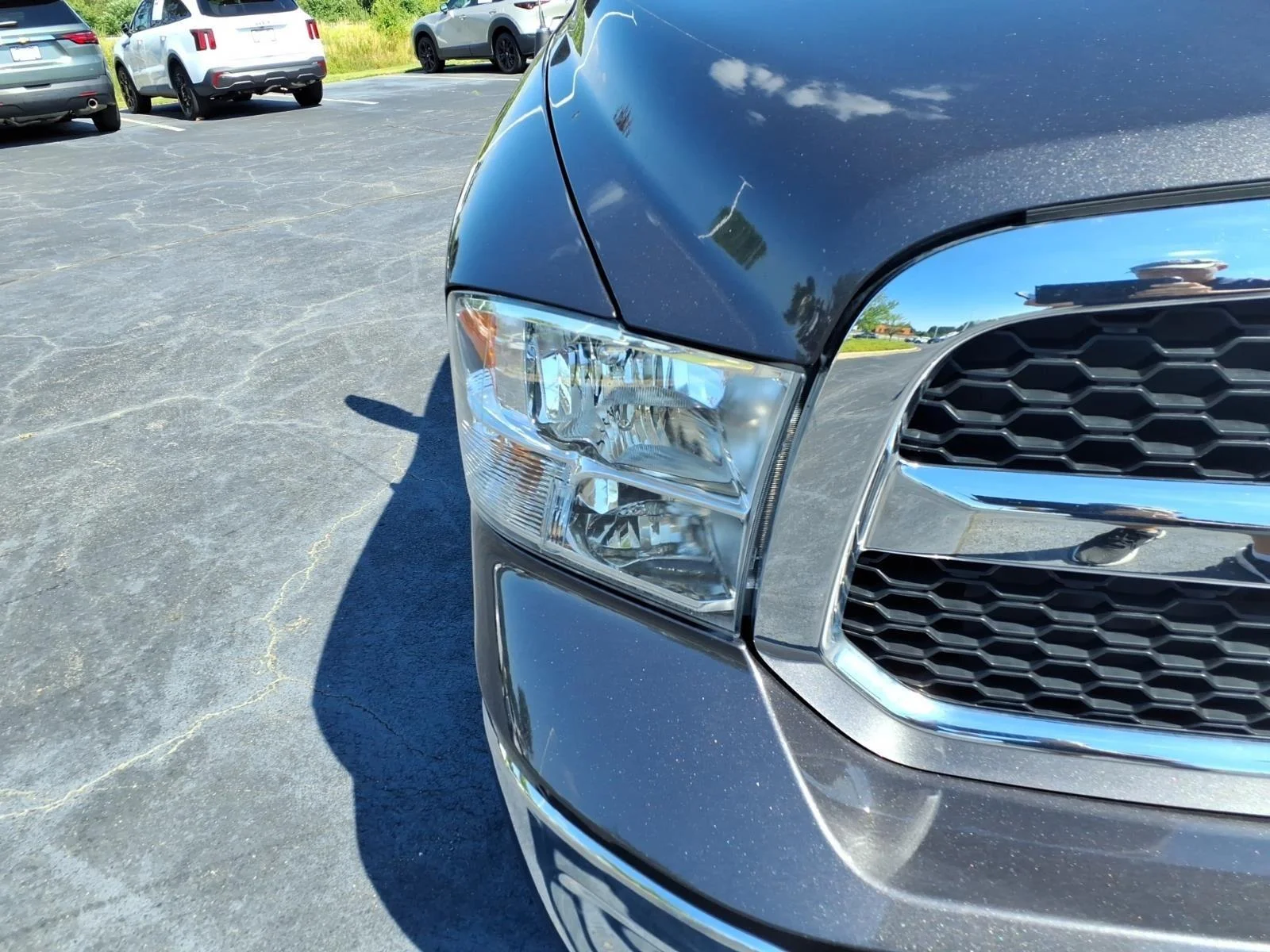 Used 2024 Granite Crystal Metallic Clearcoat Ram SLT image 13