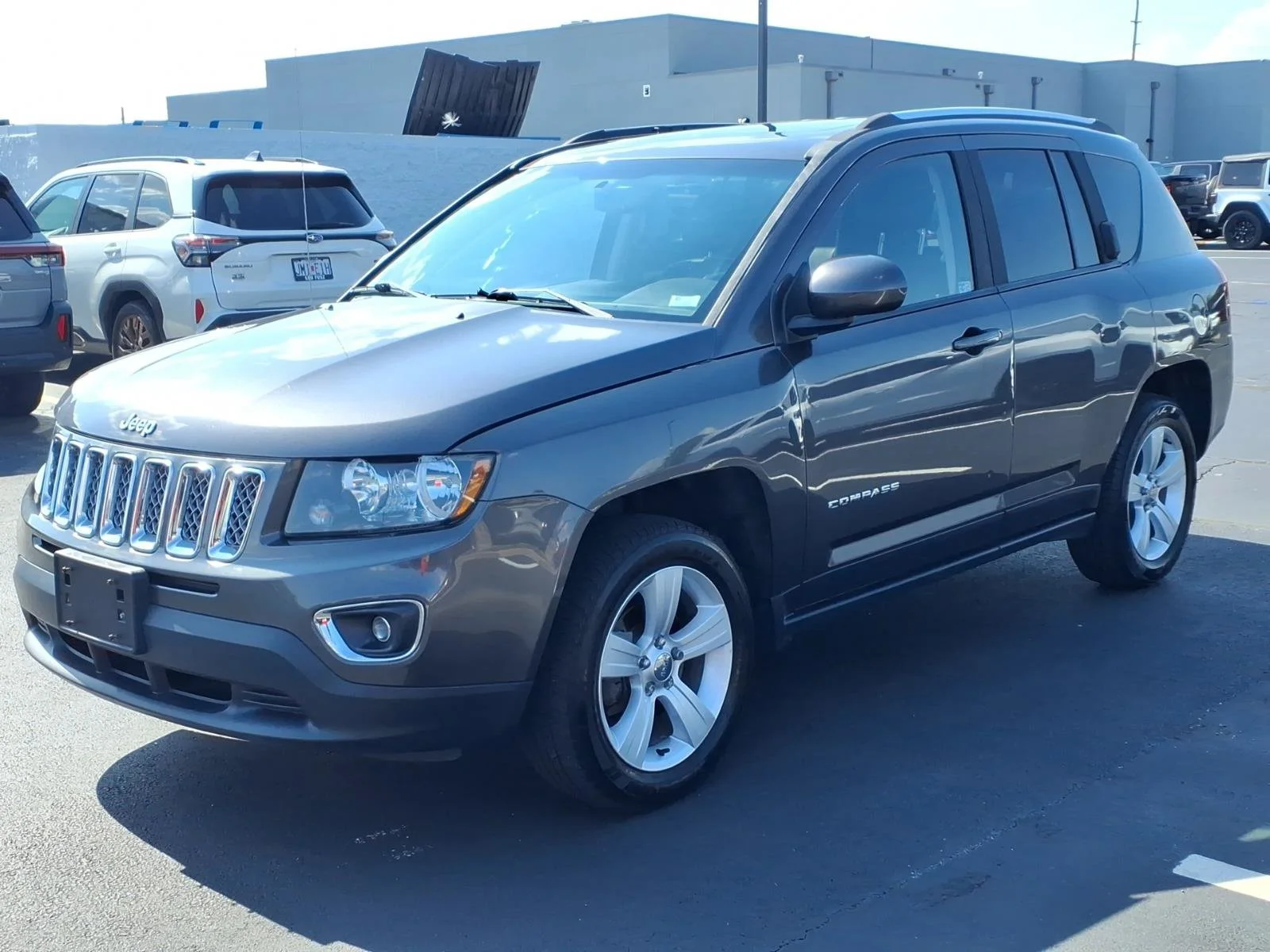 Used 2015 Jeep Compass Latitude with VIN 1C4NJCEA6FD198672 for sale in O'Fallon, MO