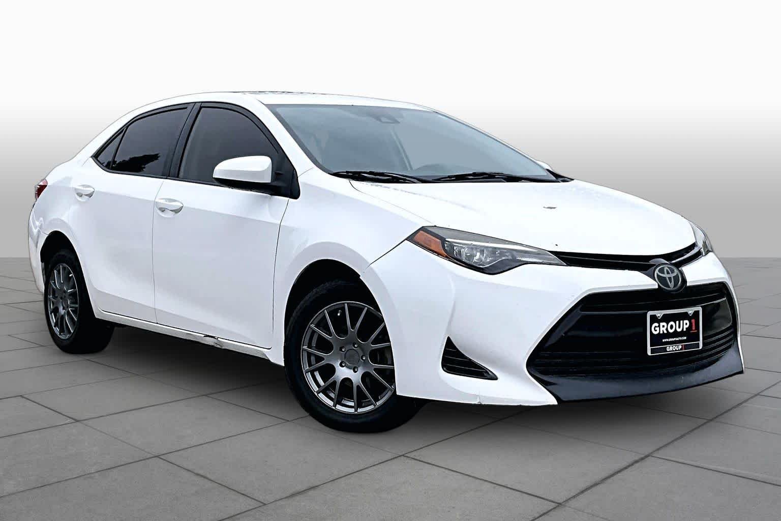 Used 2018 Super White Toyota LE image 3