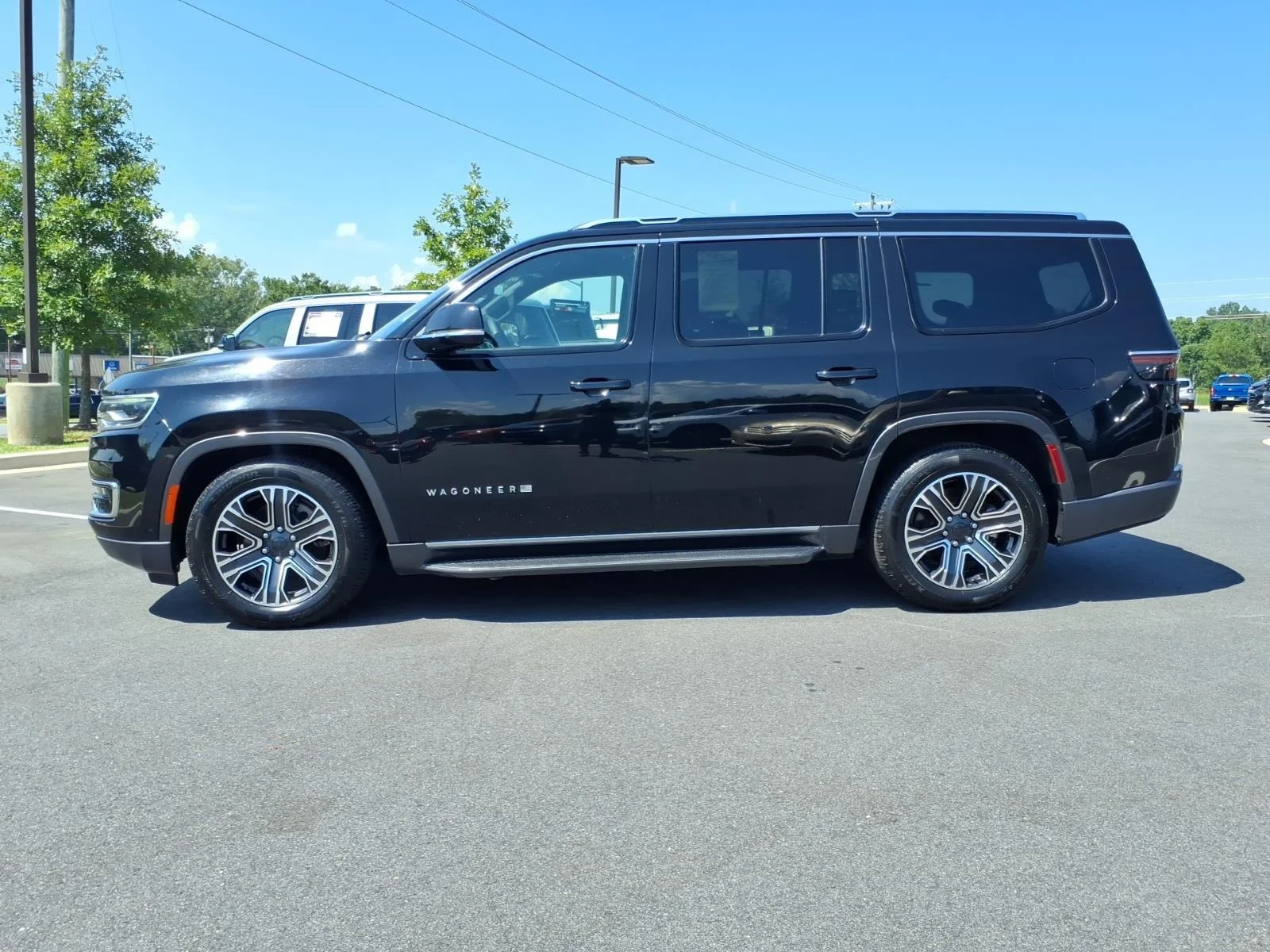 Used 2022 Diamond Black Crystal Pearlcoat Jeep Series III image 3
