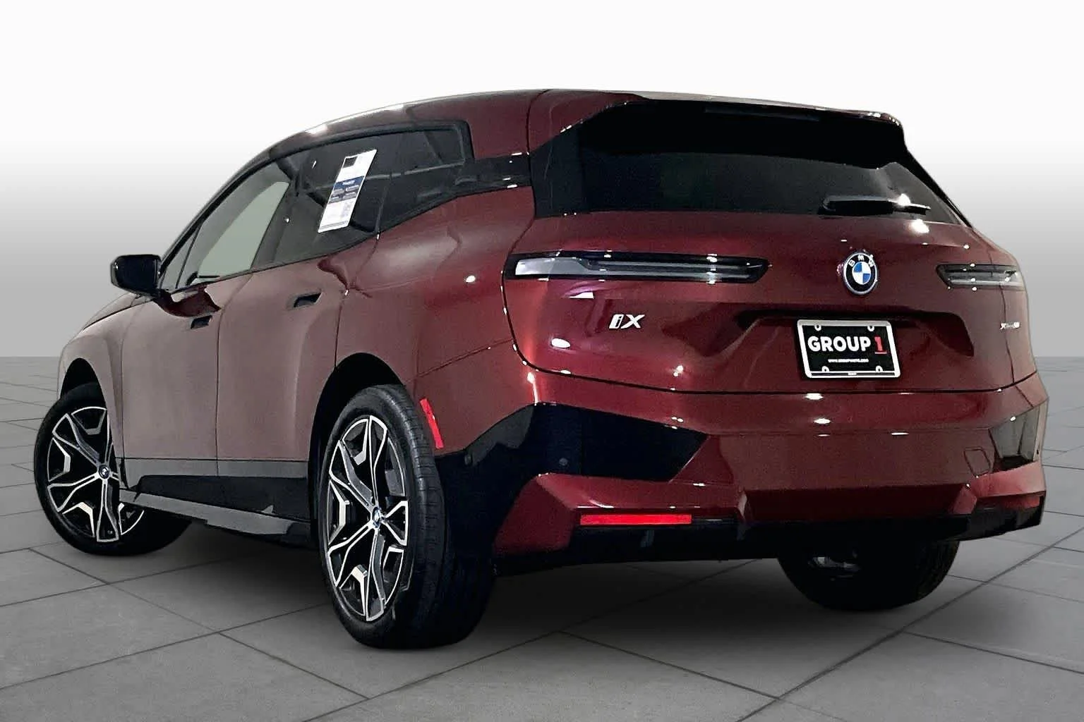 Used 2024 Aventurin Red Metallic BMW xDrive50 image 11