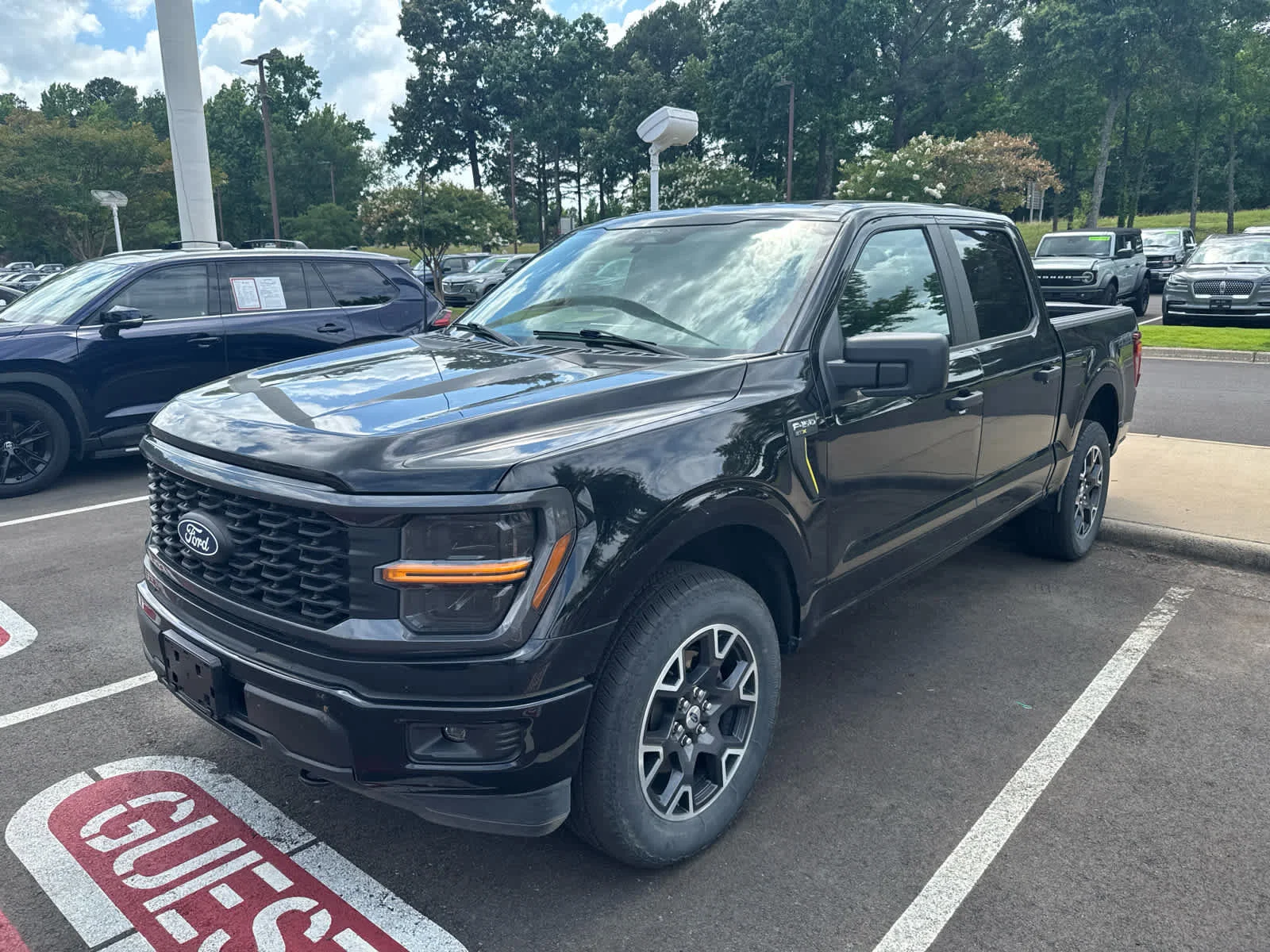 Used 2024 Agate Black Metallic Ford STX image 2