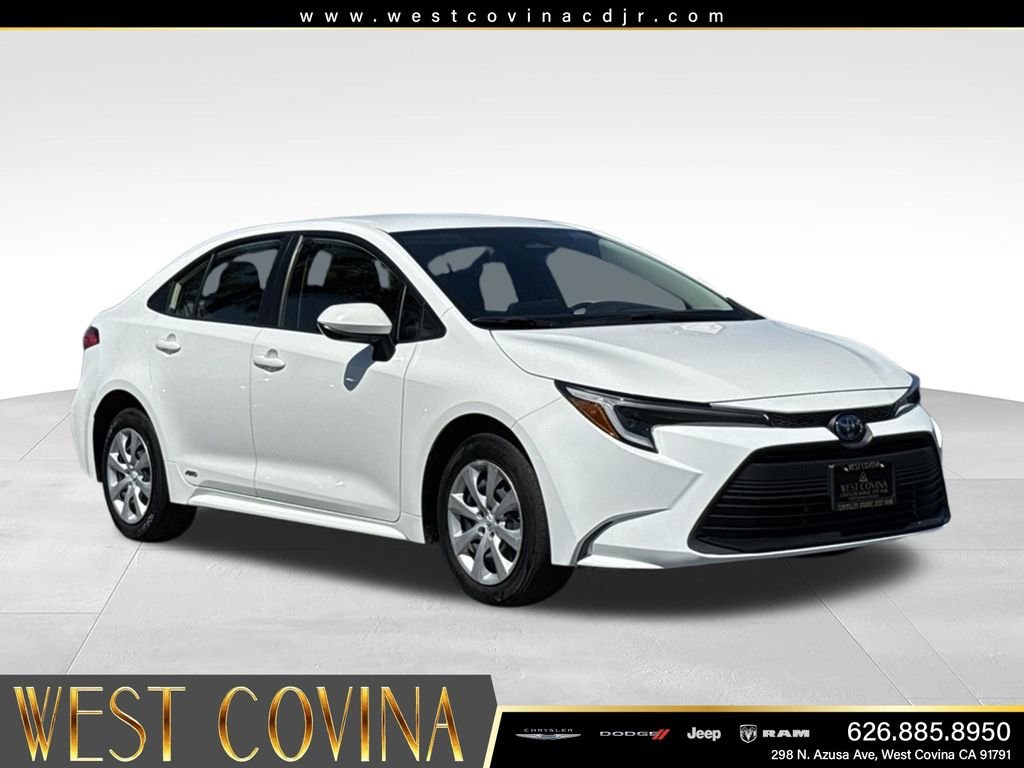 Used 2024 White Toyota LE image 1