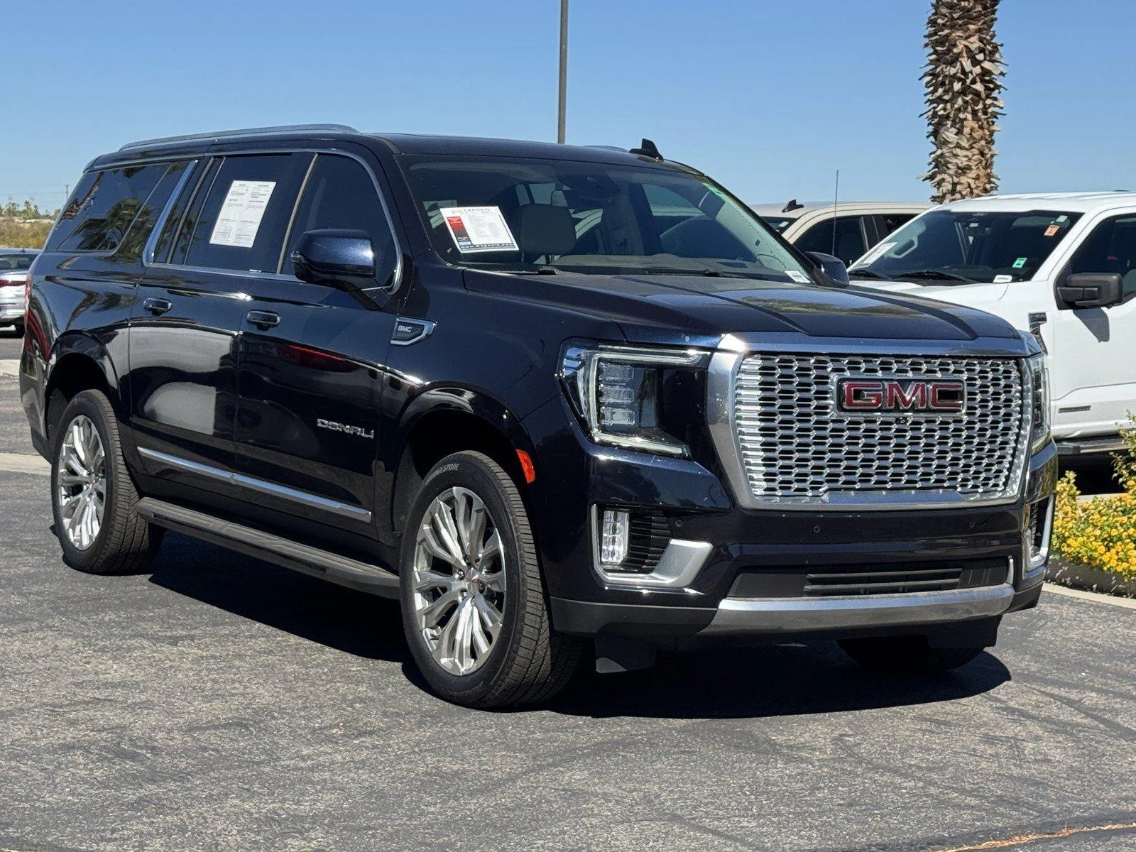Used 2024 Midnight Blue Metallic GMC Denali image 1