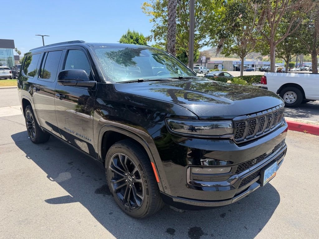 Used 2024 Black Jeep Series II image 1