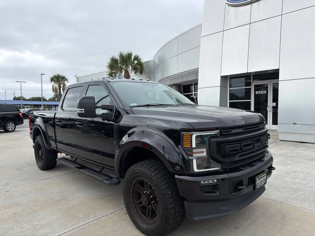 Used 2021 Agate Black Metallic Ford Lariat image 1