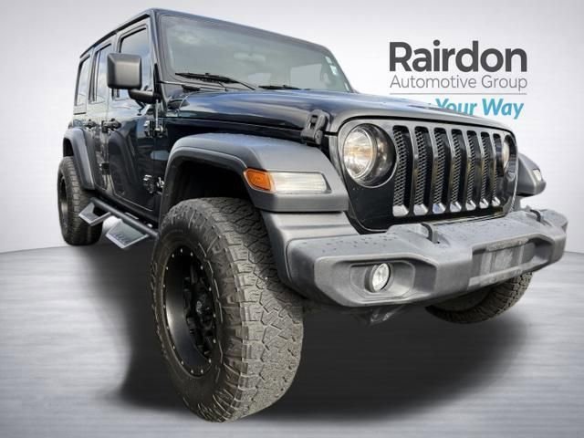 Used 2020 Black Clearcoat Jeep Sport S image 1