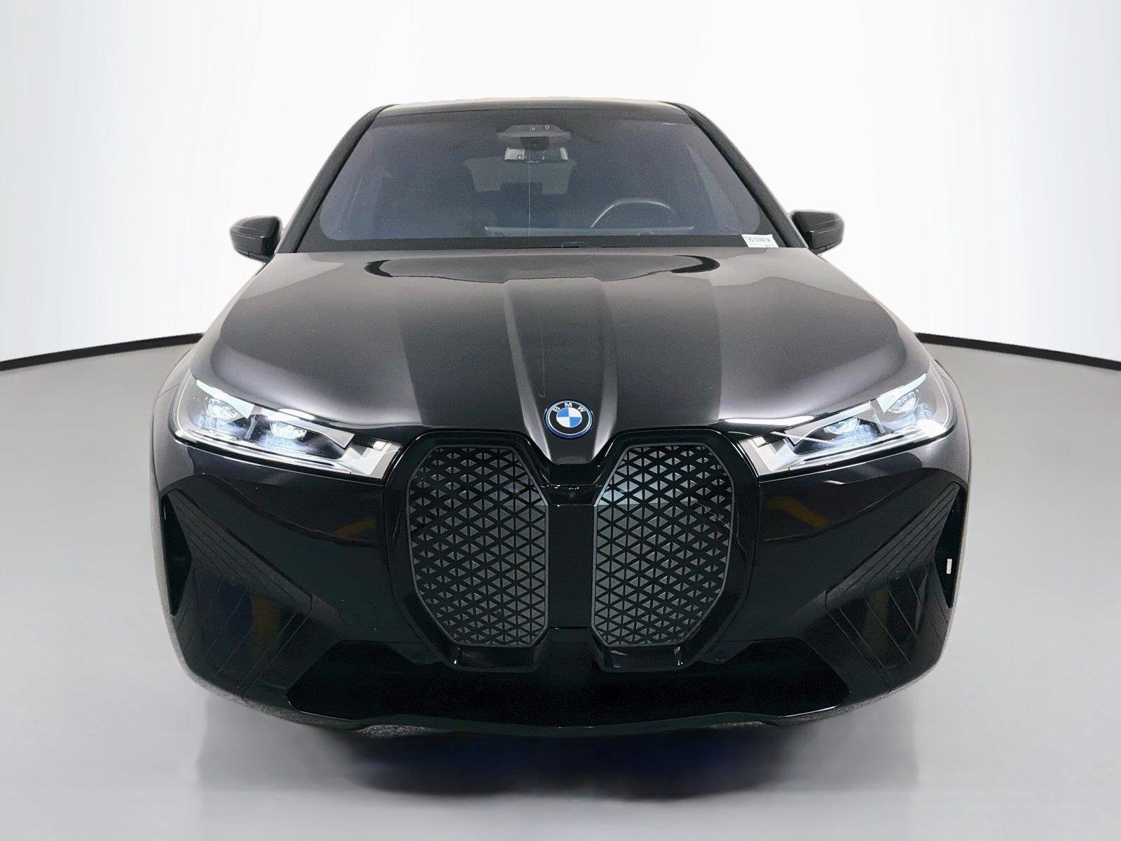 Used 2024 Black Sapphire Metallic BMW xDrive50 image 2