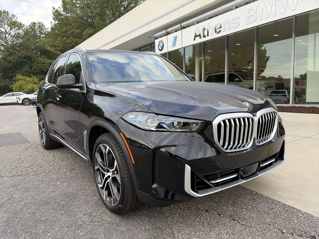 Used 2026 Black Sapphire Metallic BMW xDrive40i image 1