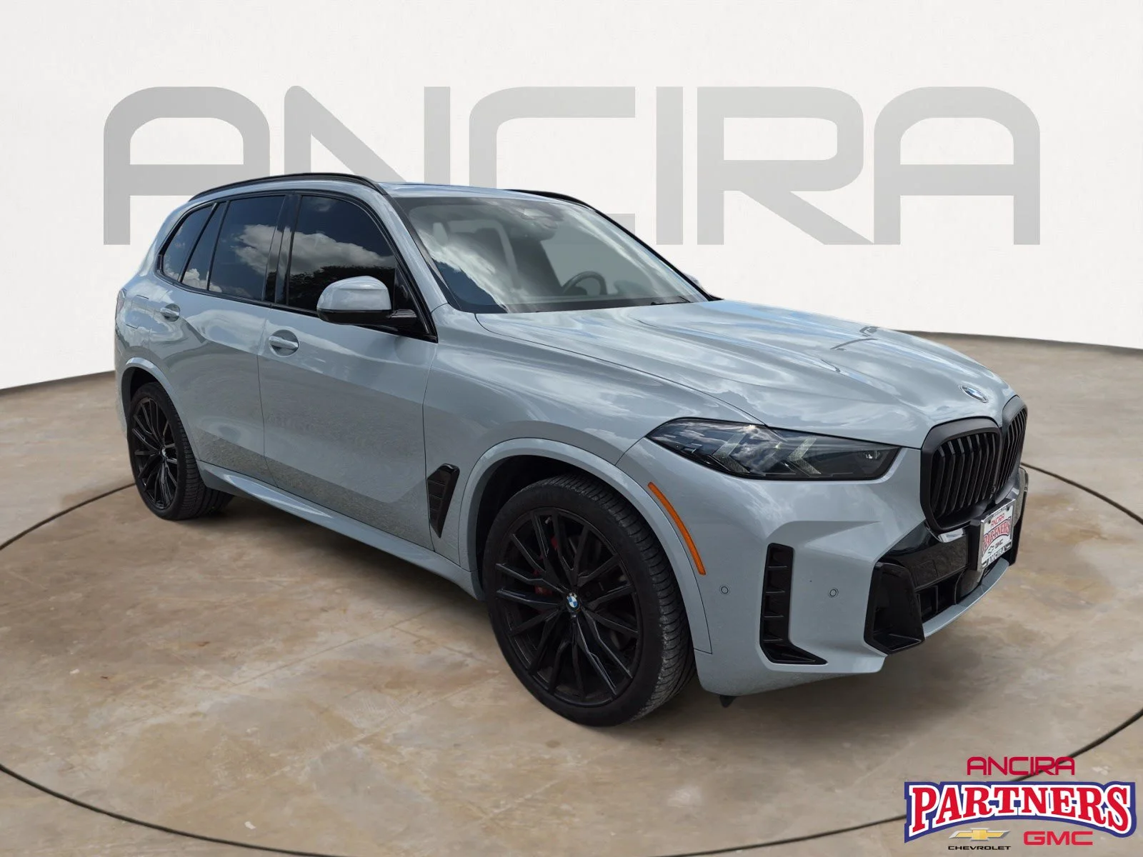 Used 2025 Brooklyn Grey Metallic BMW xDrive40i image 1