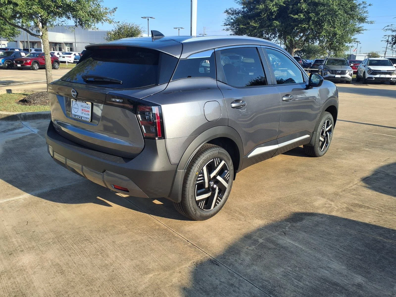 New 2027 Gun Metallic Nissan SV image 2