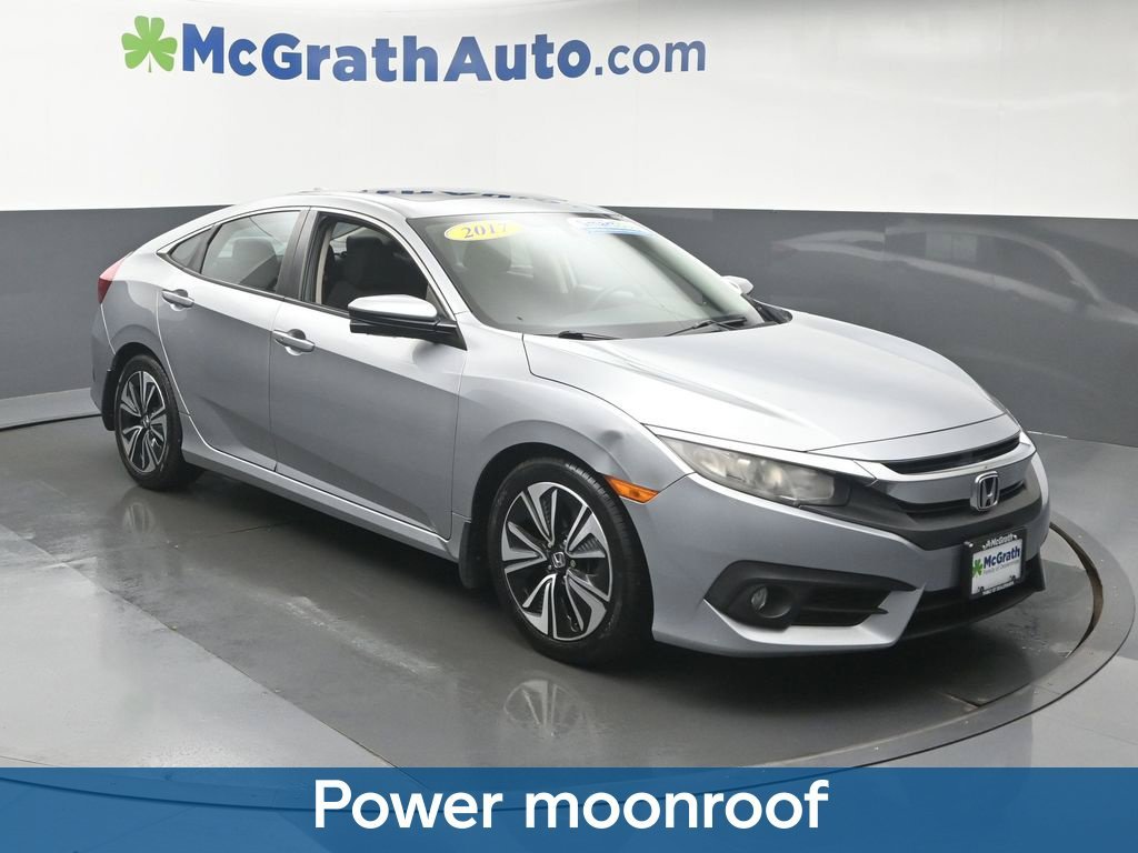 Used 2016 Honda Civic EX-T with VIN 19XFC1F32GE005520 for sale in Cedar Rapids, IA