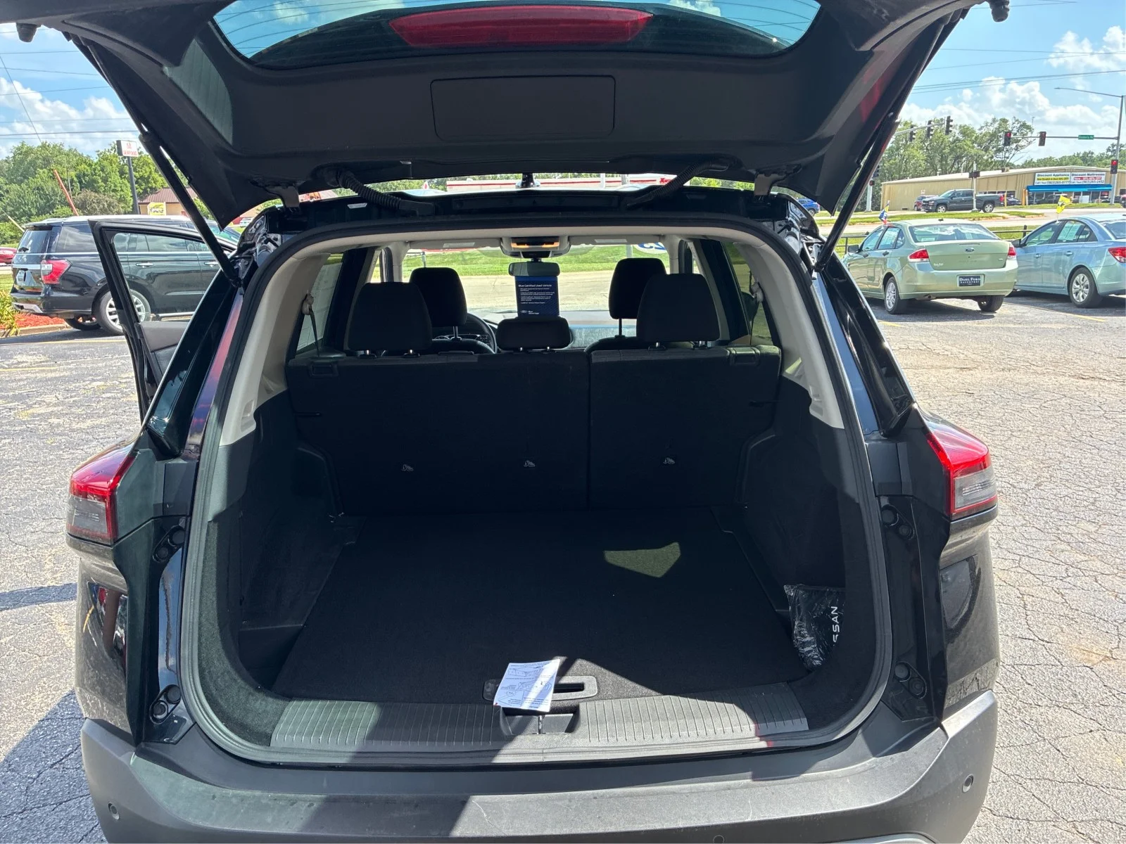 Certified Used 2023 Black Nissan SV image 10