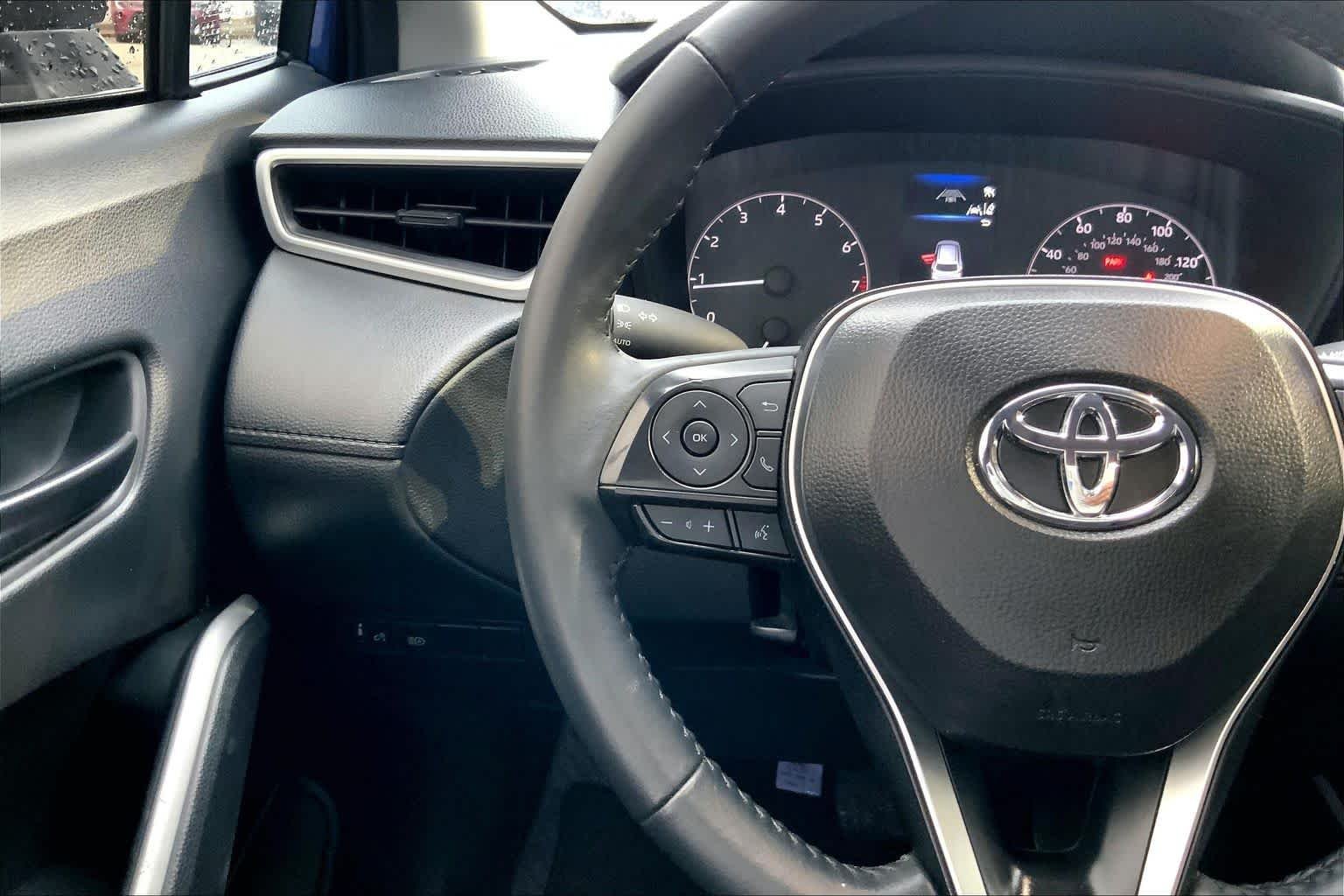 Used 2024 Blue Crush Metallic Toyota LE image 24