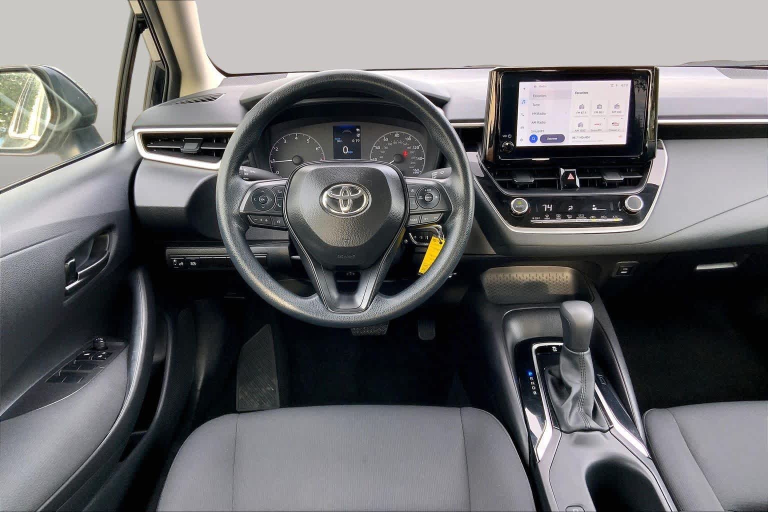 Used 2025 Midnight Black Metallic Toyota LE image 6