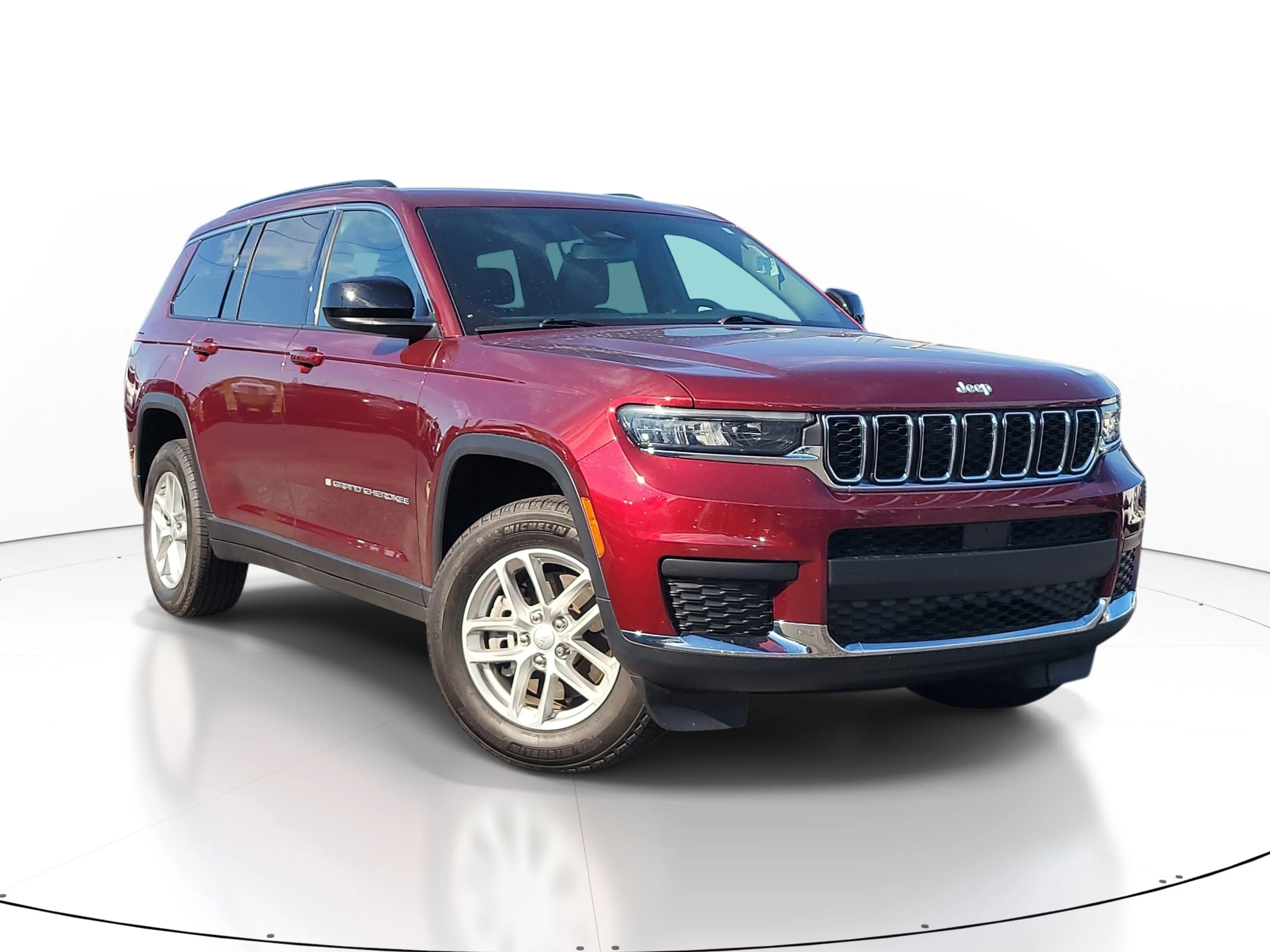 Used 2024 Velvet Red Pearlcoat Jeep Laredo image 1