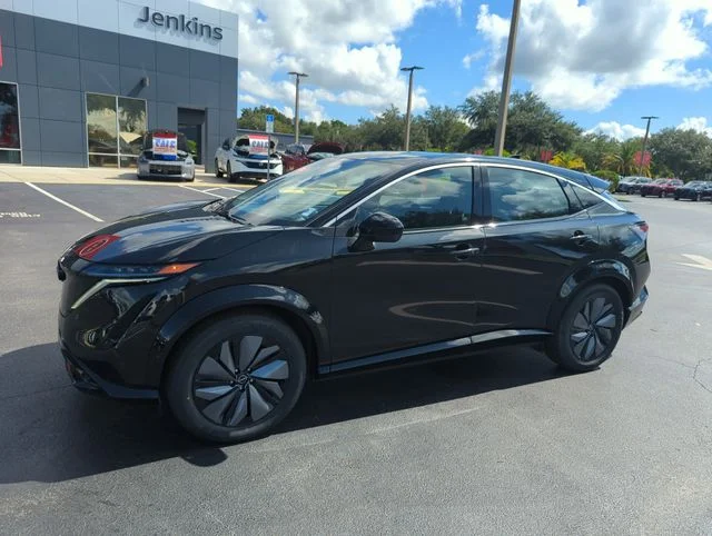 Used 2024 Black Nissan EVOLVE+ image 13
