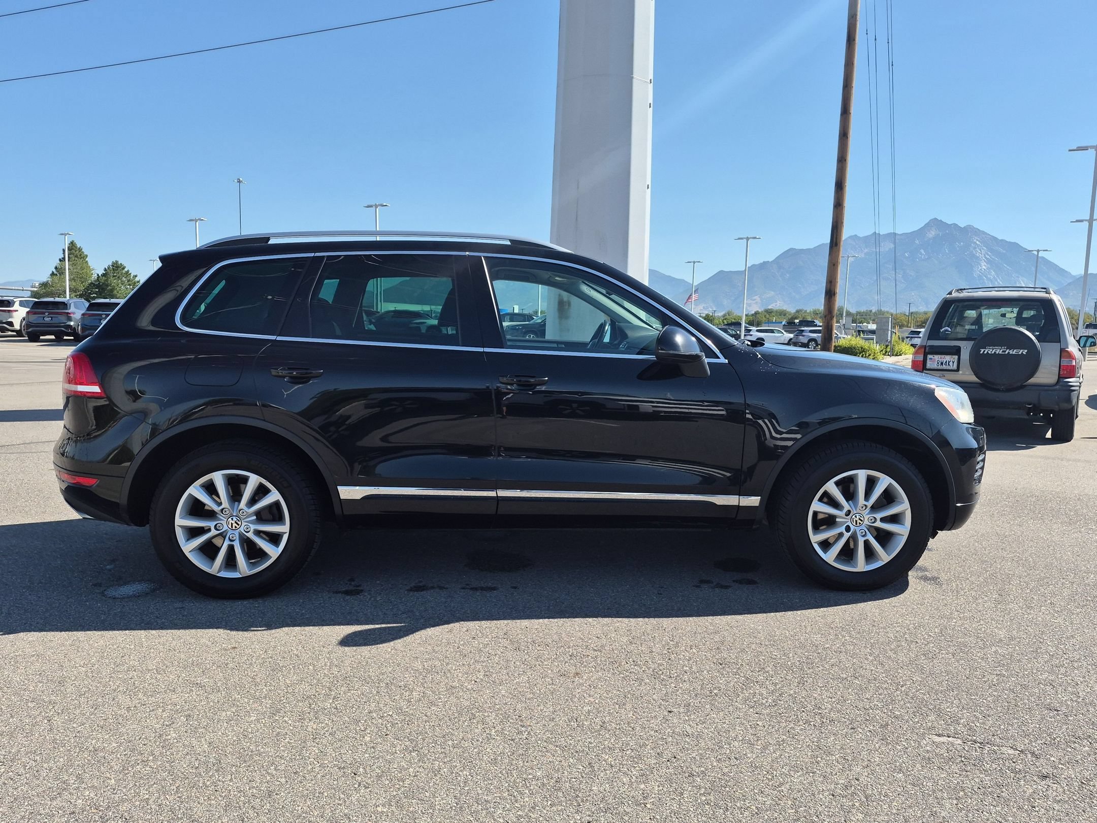 Used 2013 Volkswagen Touareg Sport with VIN WVGEF9BPXDD000360 for sale in South Jordan, UT
