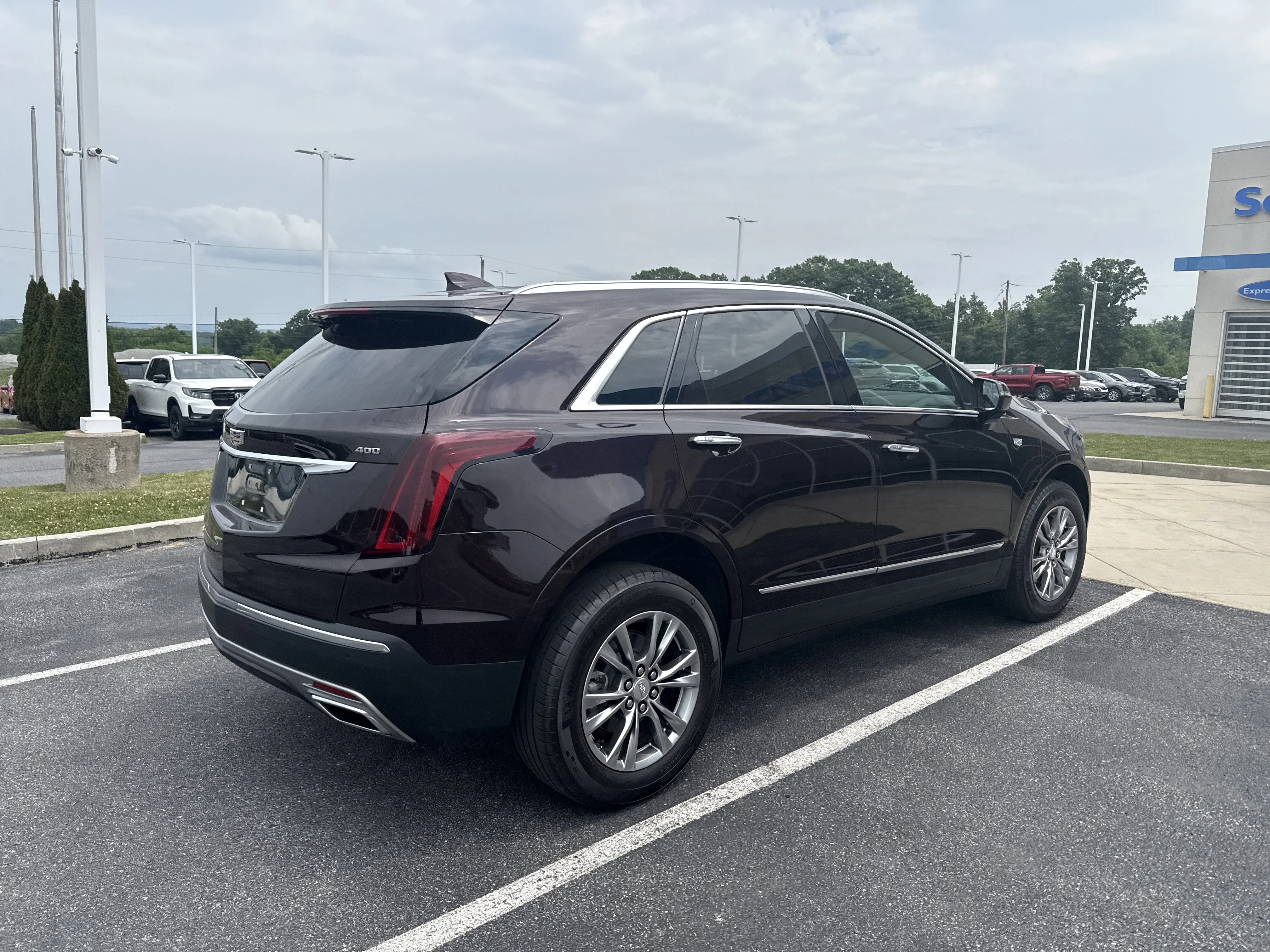Used 2021 Garnet Metallic Cadillac AWD Premium Luxury image 3