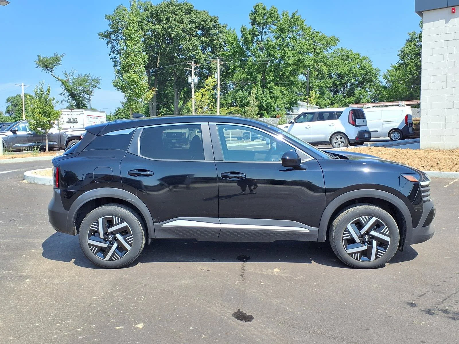 Used 2025 Super Black Nissan SV image 2