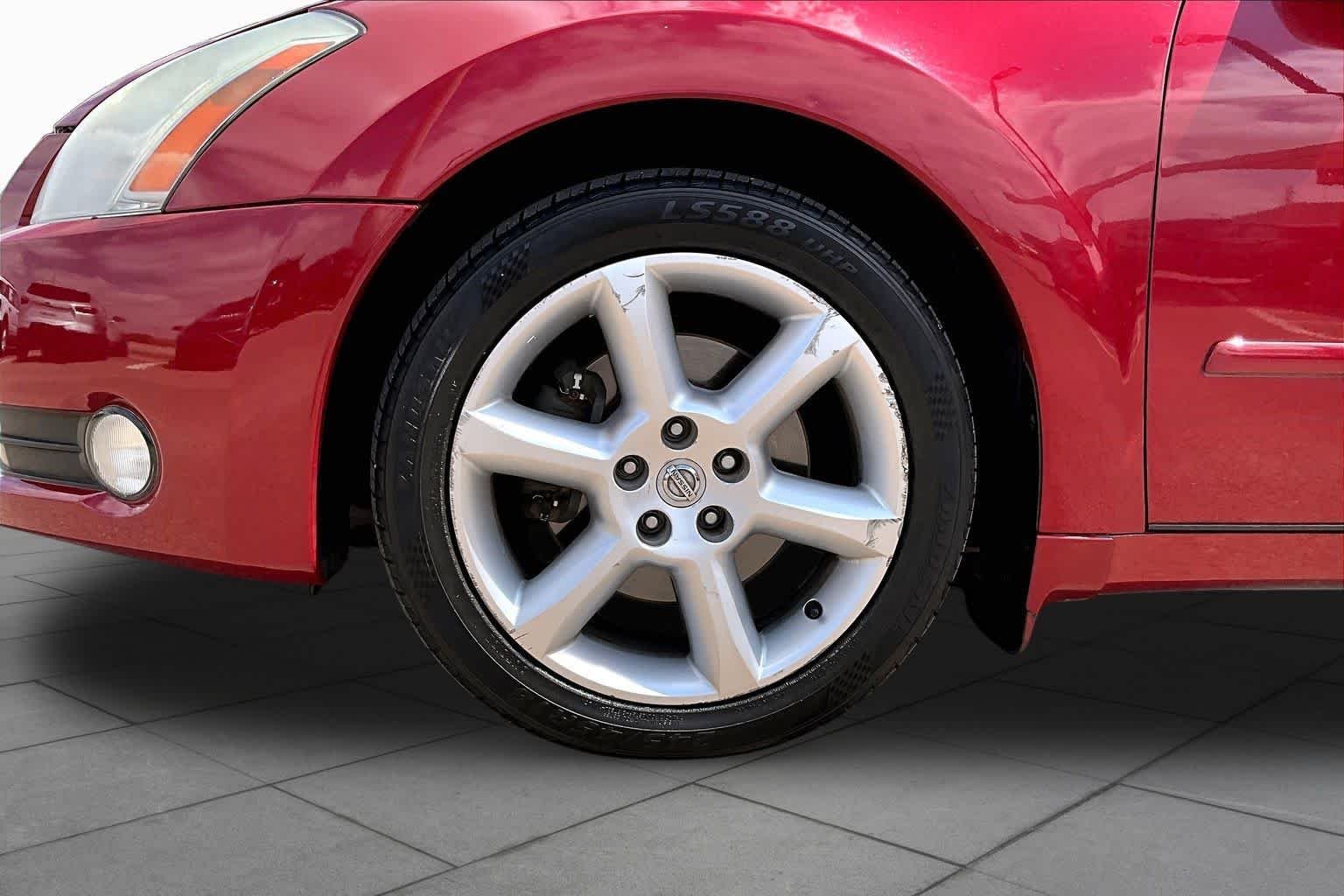 Used 2004 Red Opulence Metallic Nissan SE image 10