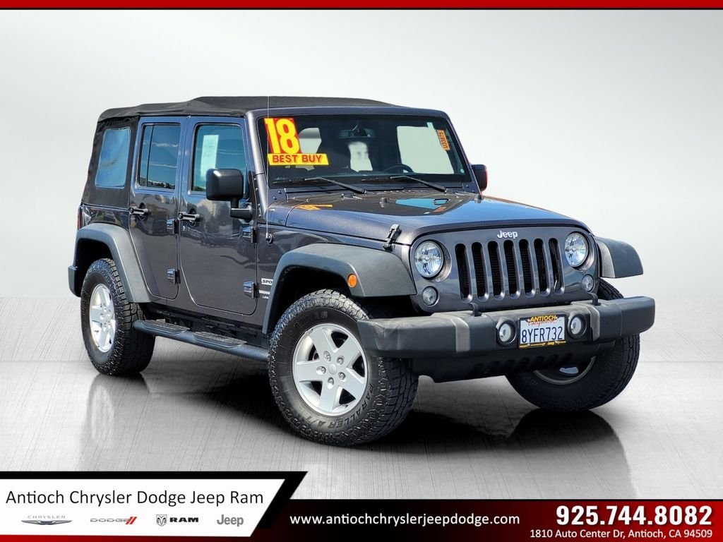 Used 2018 Gray Jeep Unlimited Sport image 1