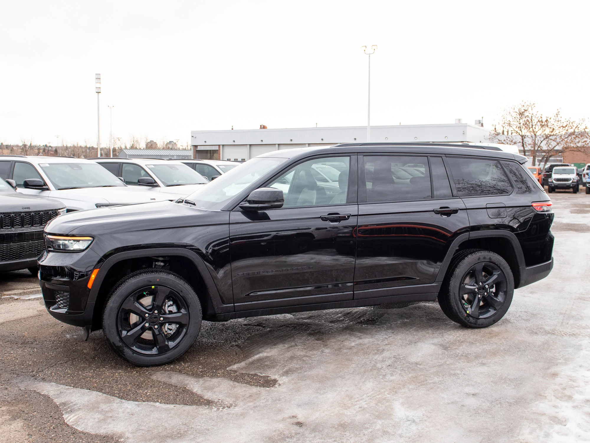 New 2025 Black Jeep Altitude* image 2