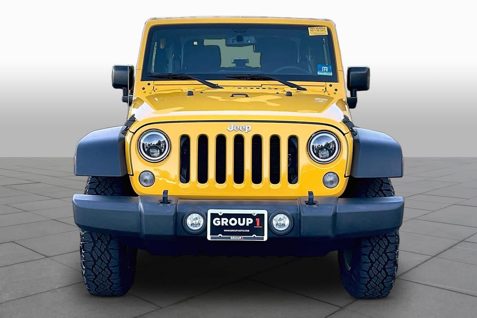Used 2015 Baja Yellow Clearcoat Jeep Sport image 4