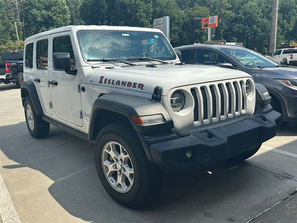 Used 2021 Bright White Clearcoat Jeep Unlimited Islander image 1
