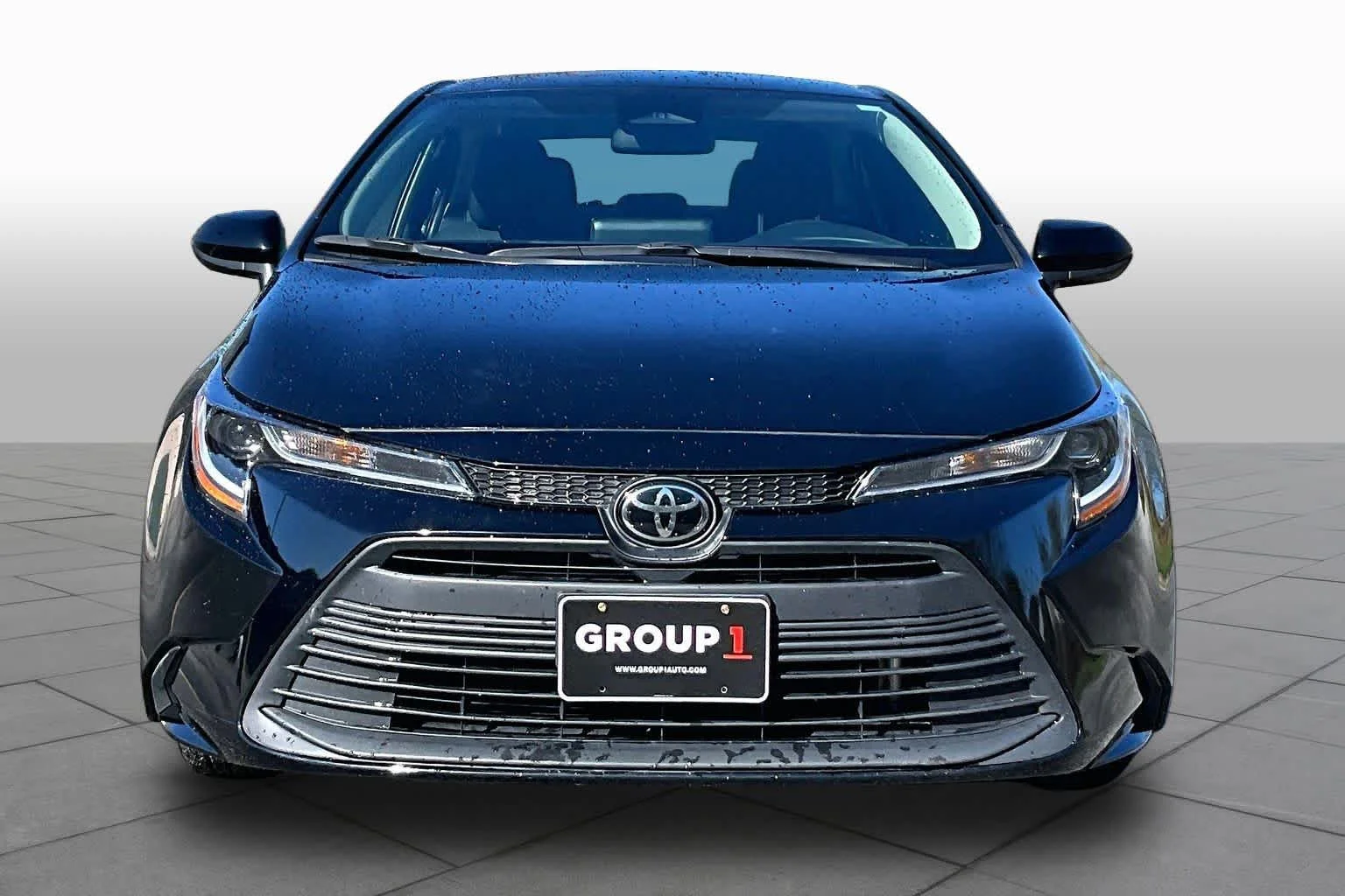 Used 2024 Midnight Black Metallic Toyota LE image 4