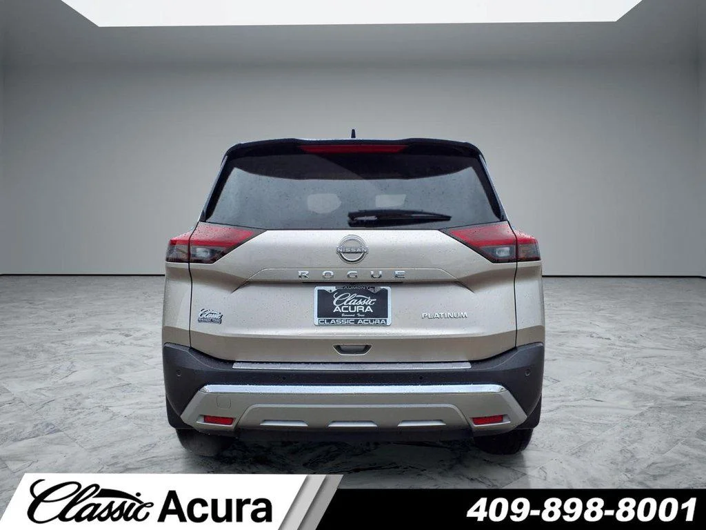 Used 2022 Champagne Silver Metallic Nissan Platinum FWD image 4