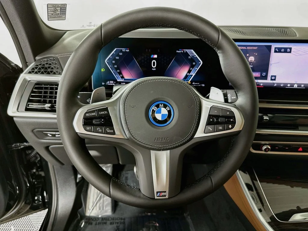 New 2026 Black Sapphire Metallic BMW xDrive50e image 12