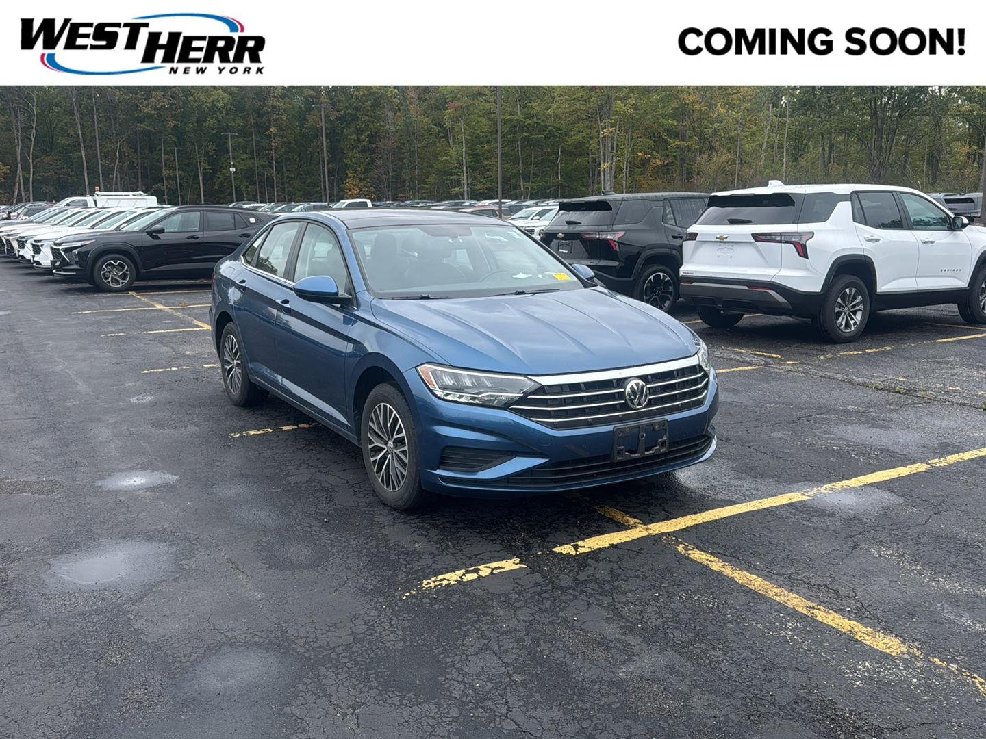 Used 2020 Blue Silk Metallic Volkswagen SE image 1