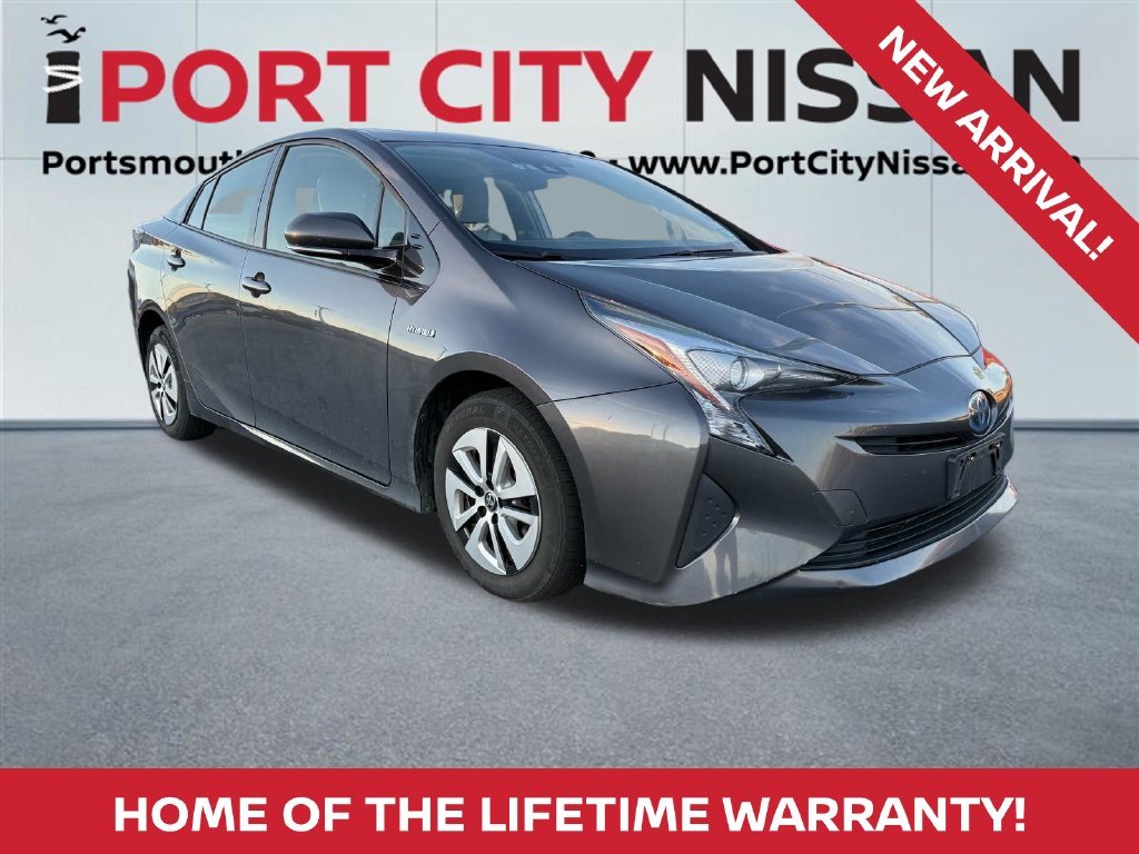 Used 2016 Magnetic Gray Metallic Toyota Three image 1