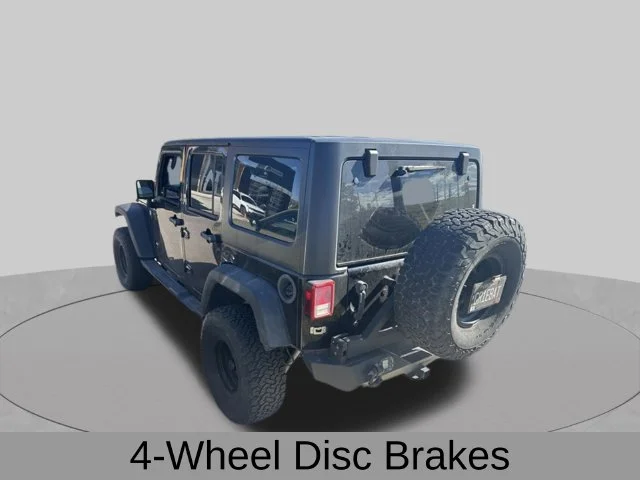 Used 2011 Black Jeep Unlimited Sport image 8