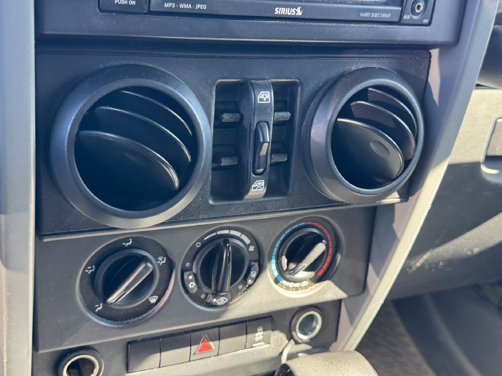 Used 2010 Green Jeep Unlimited Sport image 12